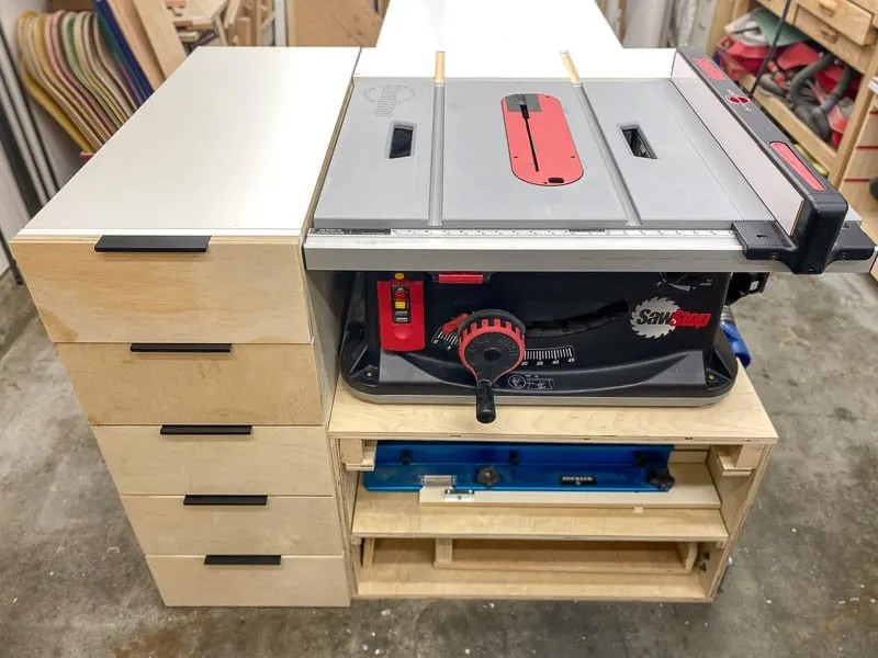 DIY table saw stand with outfeed, drawers and shelves