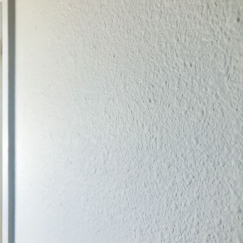 white heavily textured wall